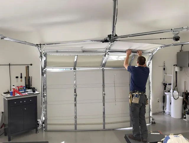 Westborough Garage Door Repair specialist performing precise section replacement on Westborough garage door