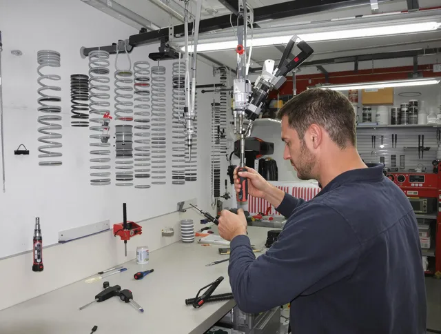 Westborough Garage Door Repair safety certified technician performing precision spring replacement in Westborough